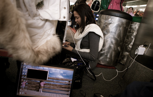 Sasha, another woman on the way to the inauguration, and I shared the plugs in an attempt to power up before our 3.5 hour flight
